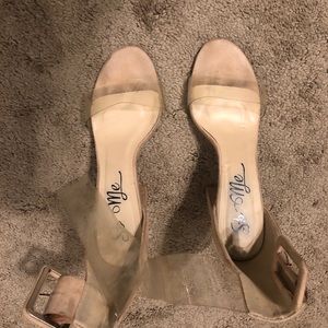 Nude colored clear strapped heels